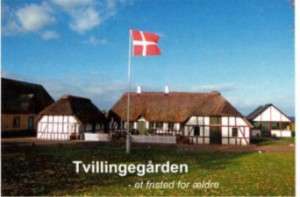 Tvillingegaarden med tekst